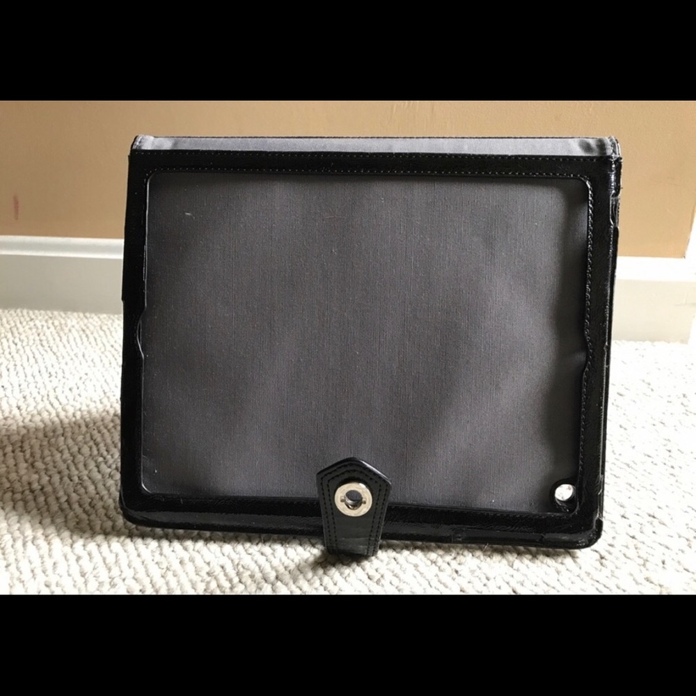 Coach: Purple Poppy Ocelot iPad/tablet cover.